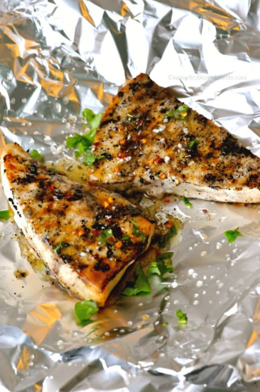 <p>First Home Love Life</p><p>An incredibly easy way to prepare swordfish with tons of flavor. This Sicilian style grilled swordfish recipe is a keeper!</p><p><strong>Get the recipe: <a href="https://www.firsthomelovelife.com/sicilian-style-grilled-swordfish.html" rel="nofollow noopener" target="_blank" data-ylk="slk:Sicilian Style Grilled Swordfish;elm:context_link;itc:0;sec:content-canvas" class="link rapid-noclick-resp">Sicilian Style Grilled Swordfish</a></strong></p>