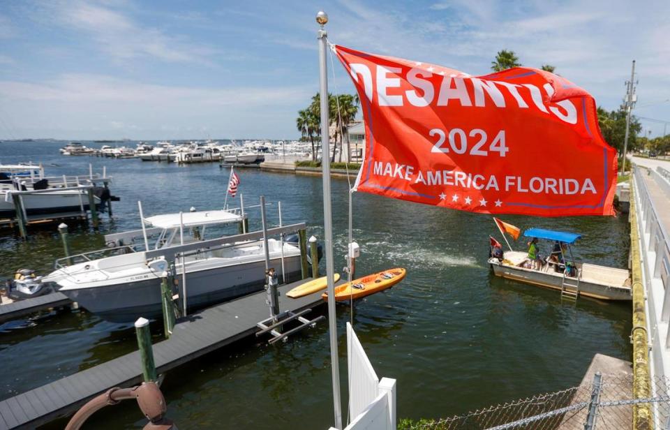 A flag promoting Gov. Ron DeSantis is seen flying in the backyard of a home near the Dunedin causeway on Friday, Aug. 6, 2021 in Dunedin.