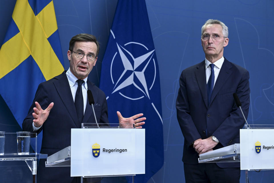 Sweden's Prime Minister Ulf Kristersson and NATO Secretary General Jens Stoltenberg during a press conference after a meeting with all Swedish party leaders who are in favor of a Swedish NATO membership in Stockholm, Sweden, Tuesday, March 7, 2023. NATO membership for Finland and Sweden is “a top priority,” alliance chief Jens Stoltenberg said Tuesday, urging members Turkey and Hungary to urgently ratify the Nordic countries’ accession. (Jonas Ekstromer/TT News Agency via AP)