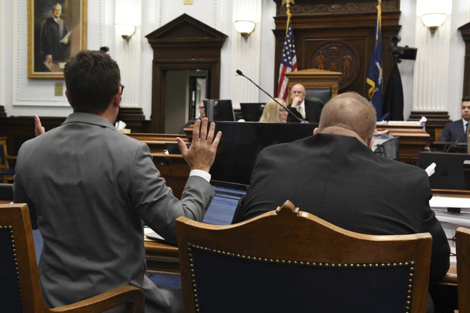 Assistant District Attorney Thomas argues against a defense motion for a mistrial because of prosecutorial misconduct during the Rittenhouse trial in Kenosha Circuit Court Wednesday, Nov. 10, 2021. Circuit Court Judge Bruce Schroeder presides. Rittenhouse is accused of killing two people and wounding a third during a protest over police brutality in Kenosha, last year. (Mark Hertzberg /Pool Photo via AP)