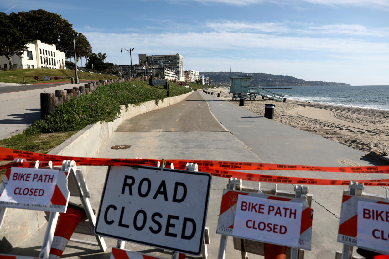 Barriers block the beach area in Redondo Beach, Calif., after Los Angeles County ordered parks, trails and beaches closed on March 28. (Patrick T. Fallon/Reuters)