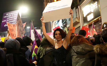 People react as police try to disperse a march marking International Women's Day in Istanbul, Turkey, March 8, 2019. REUTERS/Murad Sezer