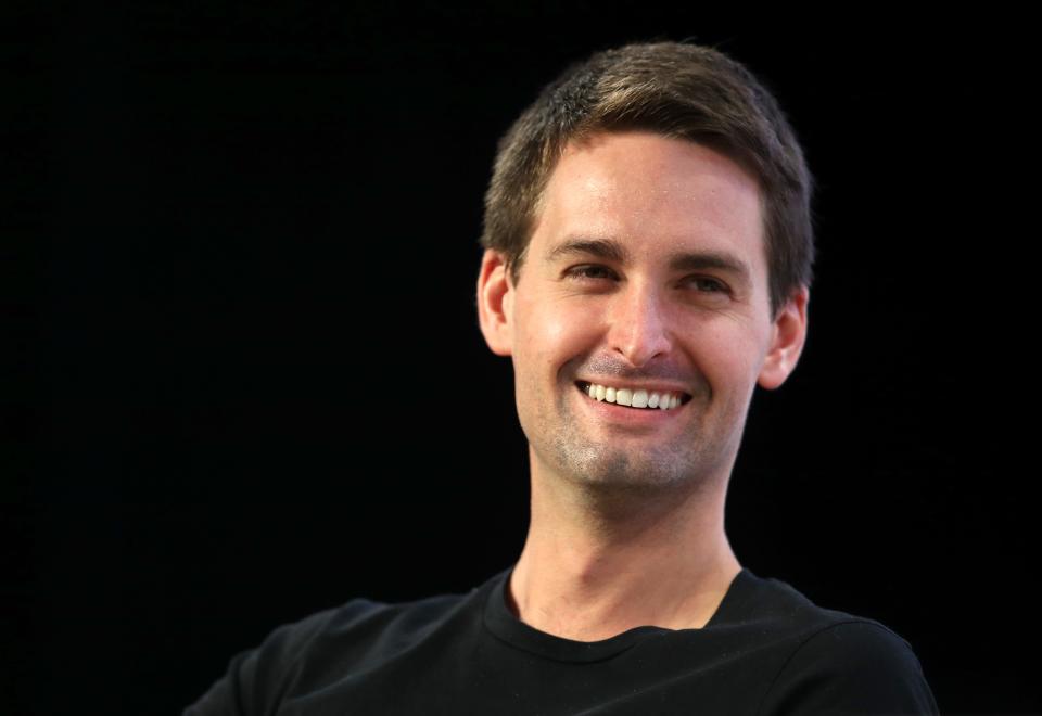 Evan Spiegel smiling during an interview at the TechCrunch Disrupt SF 2019 conference.