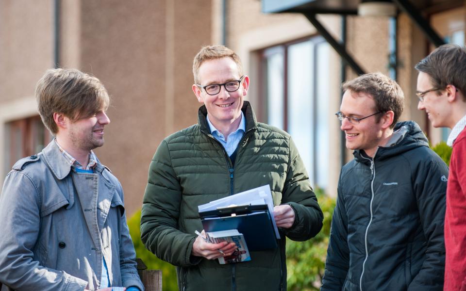 John Lamont (second left) is hoping to win the Scottish Tories' top target seat in Scotland - Credit: Stuart Nicol