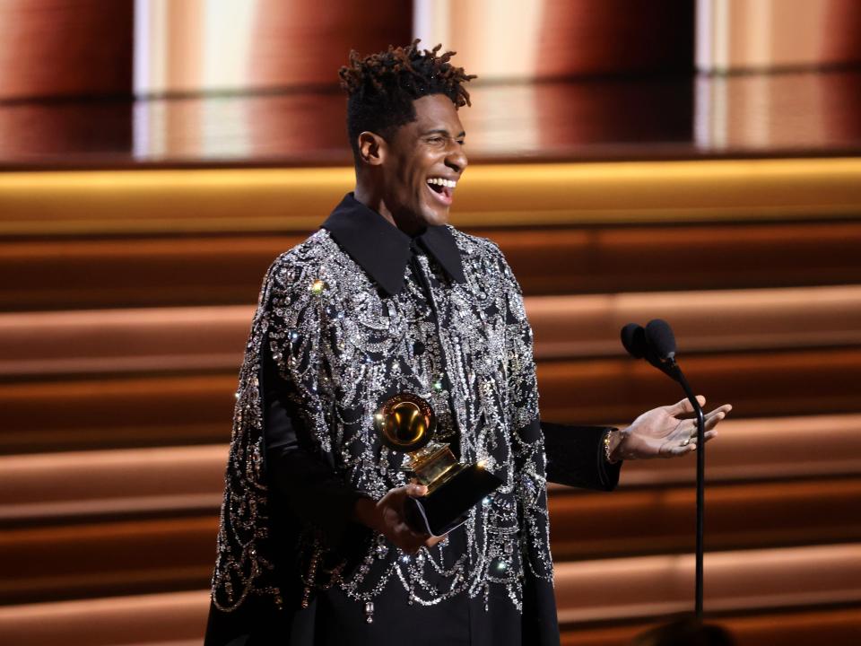 jon batiste accepting the award for album of the year award at the 2022 Grammys