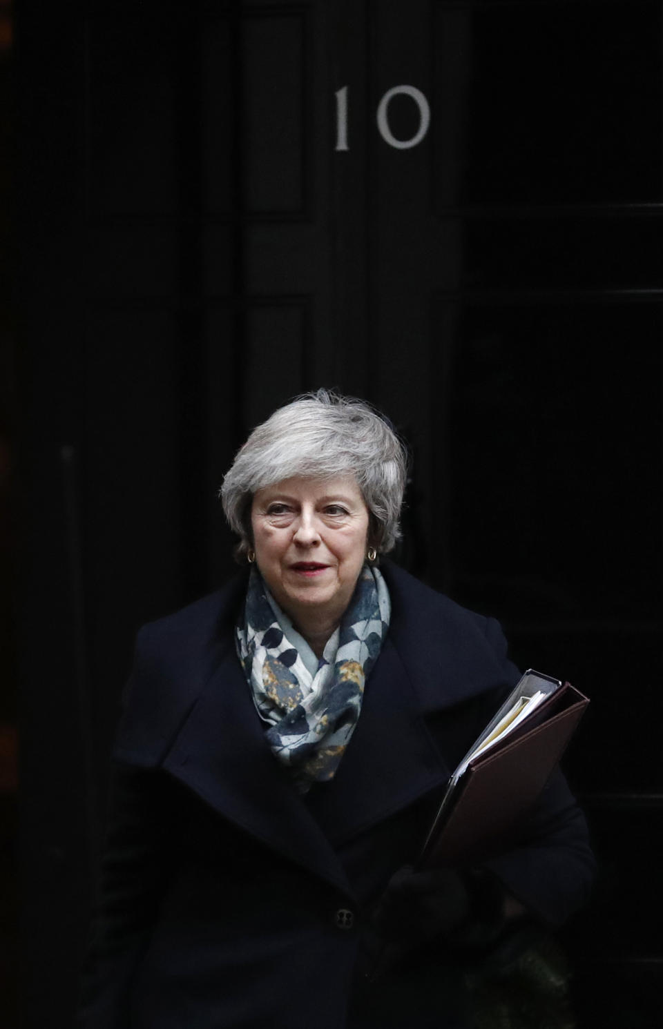 Britain's Prime Minister Theresa May leaves 10 Downing Street, in London Monday, Dec. 17, 2018, for the House of Commons to make a statement on the EU Summit held recently in Brussels. (AP Photo/Alastair Grant)