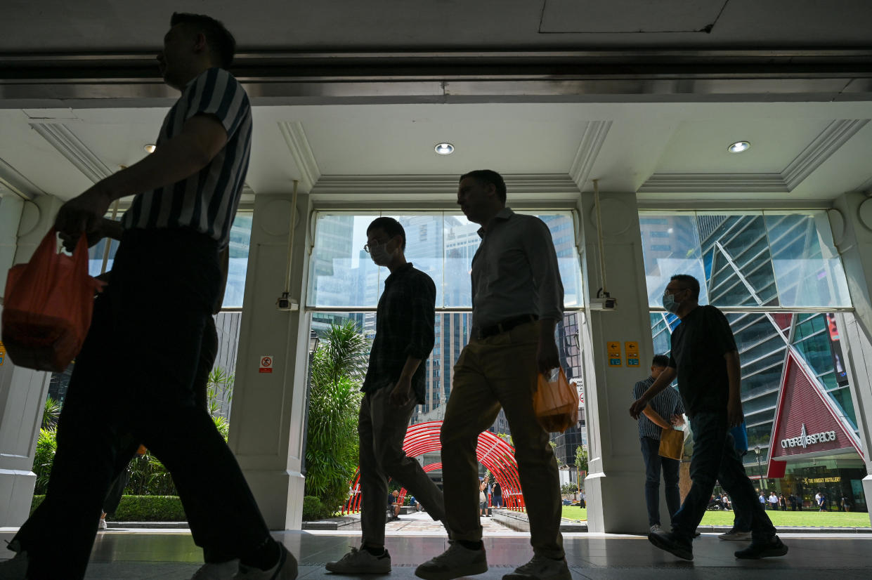 Singapore workers during the lunch break at Raffles Place.