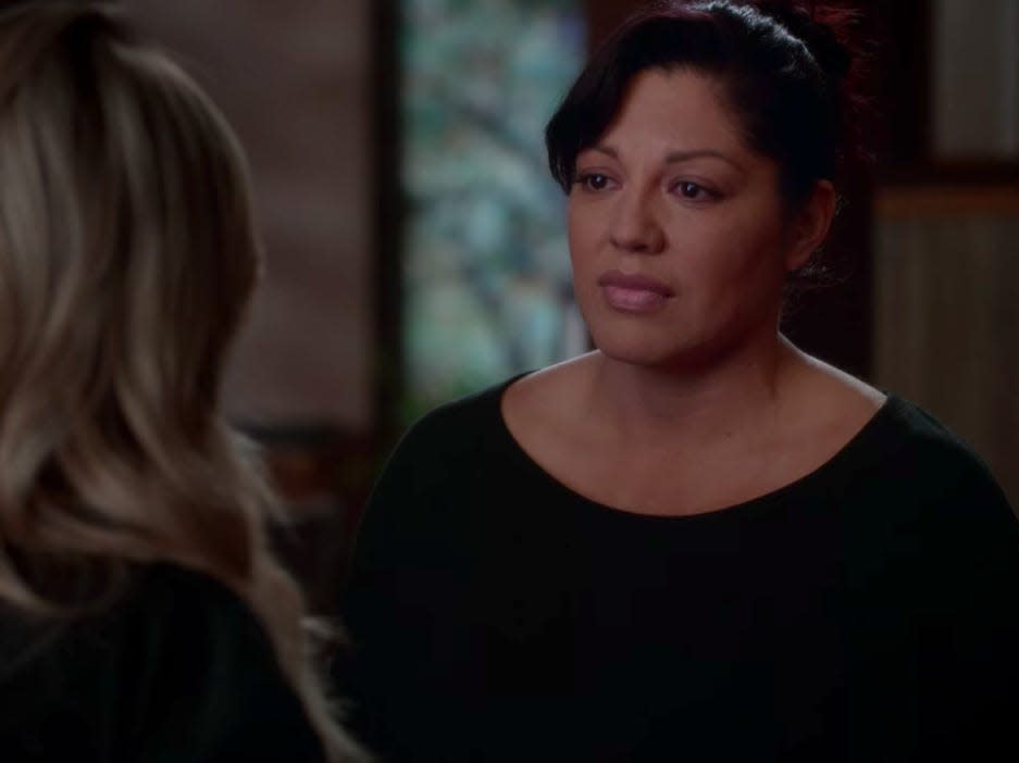 Callie on Greys Anatomy talking to Arizona and wearing dark colored sweater