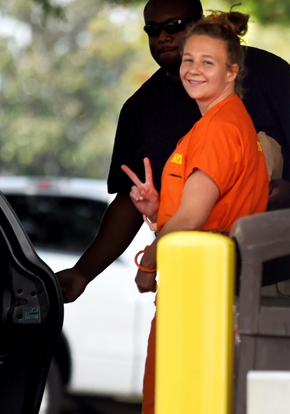 Reality Winner, who pleaded guilty to mailing a classified U.S. report to a news organization, walks out of a courthouse in Augusta, Georgia, in 2018 after being sentenced to more than five years in prison.