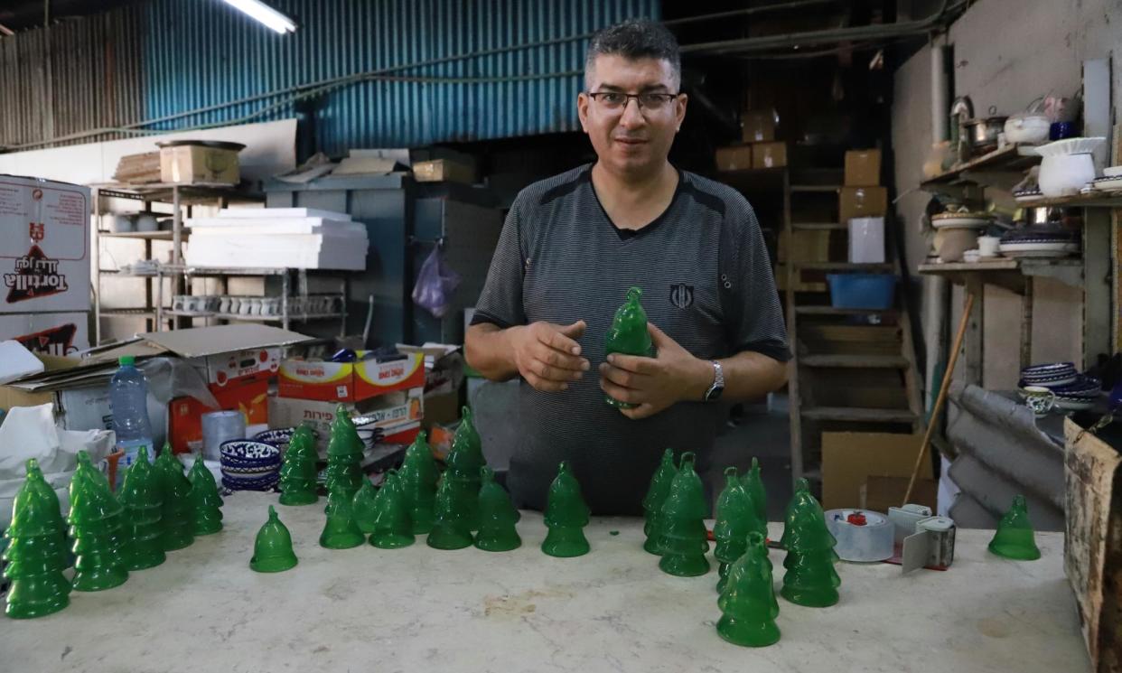 <span>Sami al-Nader says his glass and ceramics factory is empty on some days as business dries up.</span><span>Photograph: Quique Kierszenbaum/The Guardian</span>