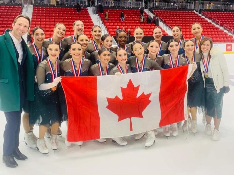 Les Suprêmes, of St-Léonard, Que., claimed its second straight world title in synchronized skating at the ISU World Synchronized Skating Championships in Lake Placid, N.Y. (@SkateCanada/Twitter - image credit)