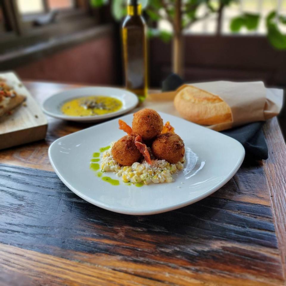 Bella Notte will offer sweet corn arancini with grilled corn, lime aioli, ricotta salata, crispy prosciutto crumble and pesto oil as a starter during Lexington Restaurant Week.