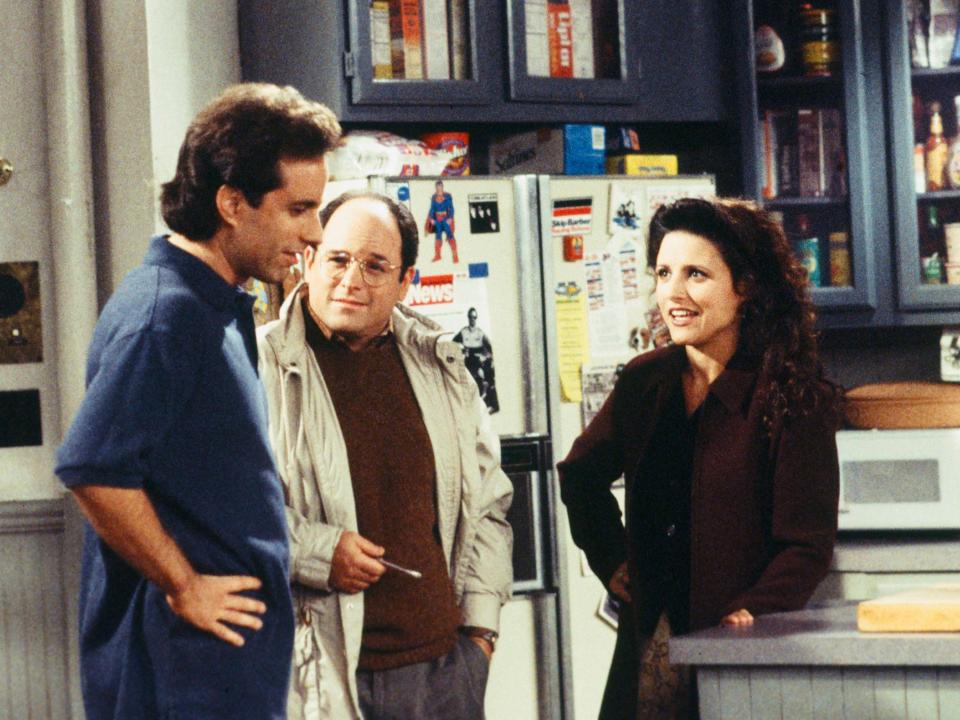 Jerry Seinfeld as himself, Jason Alexander as George Costanza, and Julia Louis-Dreyfus as Elaine Benes on "Seinfeld."