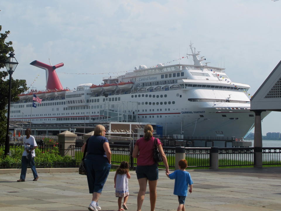 FILE - In this July 25, 2012 photo, the cruise liner Carnival Fantasy calls in Charleston, S.C. An international conference on the impact of cruises on historic port cities was under way in Charleston on Thursday, Feb. 7, 2013, where the city's year-round cruise industry has prompted lawsuits in both the state and federal courts. (AP Photo/Bruce Smith, File)