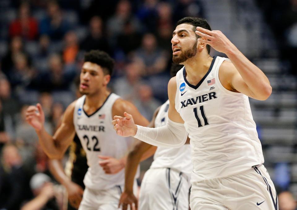 Xavier Musketeers forward Kerem Kanter (11) reacts after scoring a layup in the second half of the NCAA Tournament Second Round game between the Xavier Musketeers and the Florida State Seminoles at Bridgestone Arena in Nashville on Sunday, March 18, 2018. The 1-seeded Xavier Musketeers were upset by the 9-seed Florida State, 75-70.