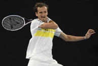 Russia's Daniil Medvedev hits a forehand return to Serbia's Novak Djokovic during the men's singles final at the Australian Open tennis championship in Melbourne, Australia, Sunday, Feb. 21, 2021.(AP Photo/Andy Brownbill)