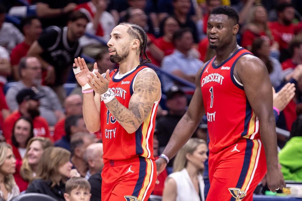 Apr 16, 2024; New Orleans, Louisiana, USA; New Orleans Pelicans guard Jose Alvarado (15) and forward Zion Williamson (1) react against the Los Angeles Lakers on a time out during the first half of a play-in game of the 2024 NBA playoffs against the New Orleans Pelicans at Smoothie King Center. Mandatory Credit: Stephen Lew-USA TODAY Sports