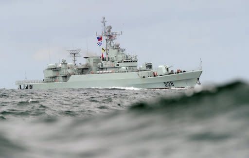 The Chinese frigate 'Mianyang' steams through the swell in 2010. China has warned the United States to stay out of the deepening territorial spat in the South China Sea and accused other countries in the region of provocation, according to a report in the Wall Street Journal