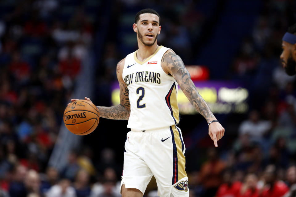 New Orleans Pelicans guard Lonzo Ball (2) in the first half of a preseason NBA basketball game against the Utah Jazz in New Orleans, Friday, Oct. 11, 2019. (AP Photo/Tyler Kaufman)