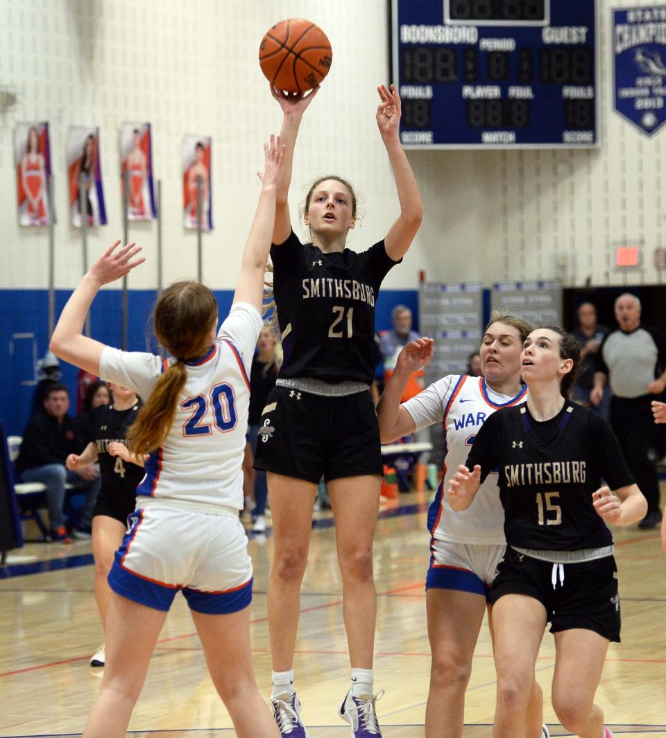 Smithsburg's Skyla Mastronardi shoots over Boonsboro's Maya Fravel and finished with 27 points, leading the Leopards to a 51-36 victory on Jan. 29, 2024.