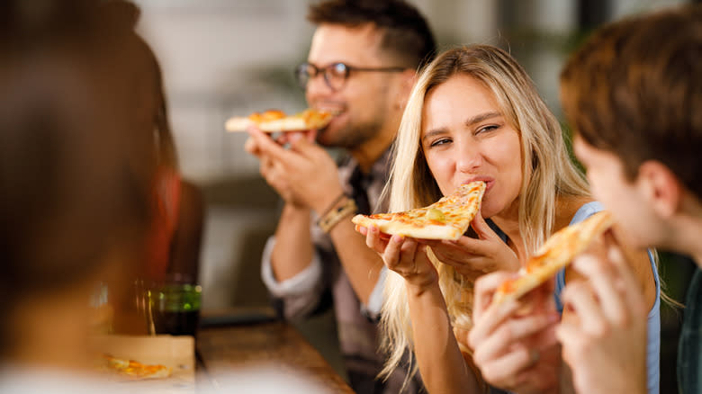 people eating pizza