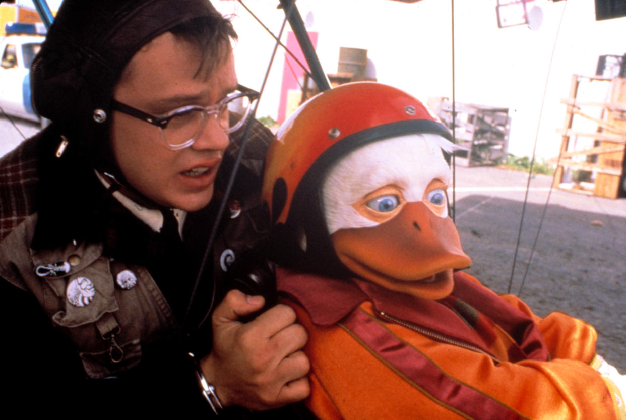 Tim Robbins and the title character of the notorious 1986 bomb, Howard the Duck, which is celebrating its 35th anniversary. (Photo: Universal Pictures/ Courtesy: Everett Collection.)