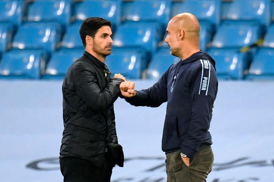 Pep Guardiola (right) greets Arsenal manager Mikel Arteta before their recent FA Cup clash (Peter Powell/NMC Pool/PA)
