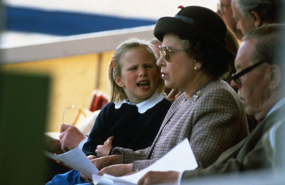 <p>After reading together, Queen Elizabeth chats to her granddaughter Zara Phillips at The Royal Windsor Horse Show.</p>