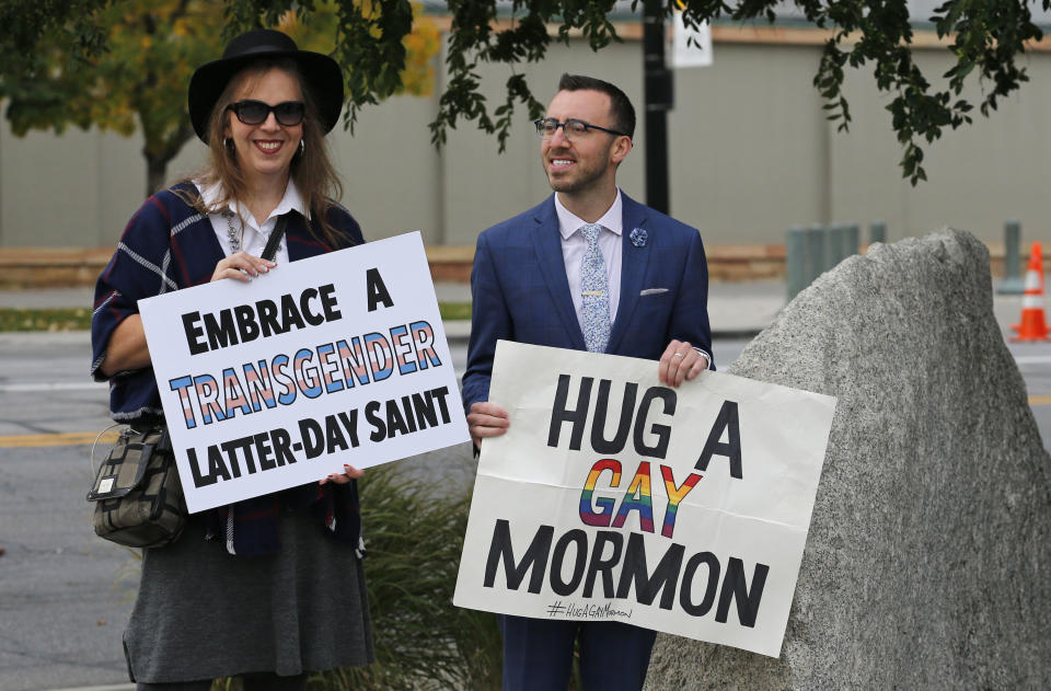 People arrive for the twice-annual conference of The Church of Jesus Christ of Latter-day Saints, Saturday, Oct. 6, 2018, in Salt Lake City. (AP Photo/Rick Bowmer)