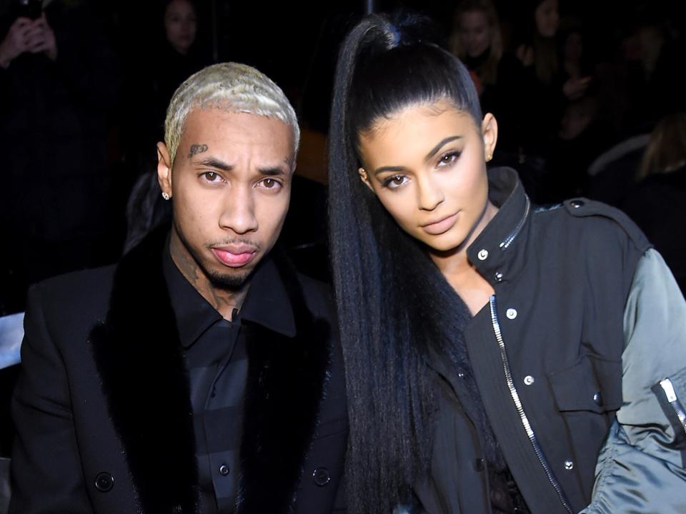 Tyga and TV personality Kylie Jenner attend the Alexander Wang Fall 2016 fashion show during New York Fashion Week at St. Bartholomew's Church on February 13, 2016 in New York City