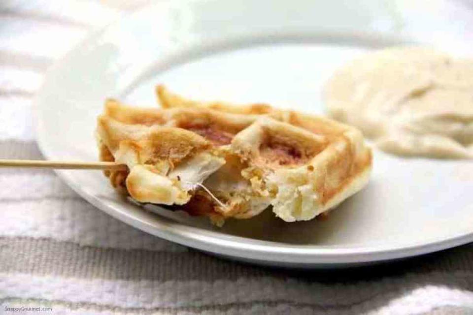 <p>Snappy Gourmet</p><p>Whether you enjoy this for an appetizer or just for a fun spin on dinner, these chicken tenders are dipped in batter and cooked in the waffle iron. Everyone will enjoy Chicken Stuffed Waffle Pops for a hearty delicious take on dinner classics!</p><p><strong>Get The Recipe: <a href="https://snappygourmet.com/crunchy-chicken-stuffed-waffle-pops-maple-dijon-dip/" rel="nofollow noopener" target="_blank" data-ylk="slk:Chicken Stuffed Waffles Pops;elm:context_link;itc:0;sec:content-canvas" class="link ">Chicken Stuffed Waffles Pops</a></strong></p>