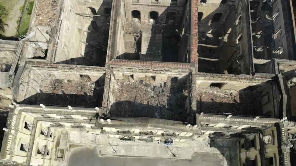 The National Museum, seen from above, stands gutted after an overnight fire in Rio de Janeiro, Brazil, Monday, Sept. 3, 2018. A huge fire engulfed Brazil’s 200-year-old museum, lighting up the night sky with towering flames as firefighters and museum workers raced to save historical relics from the blaze. (AP Photo/Mario Lobao)