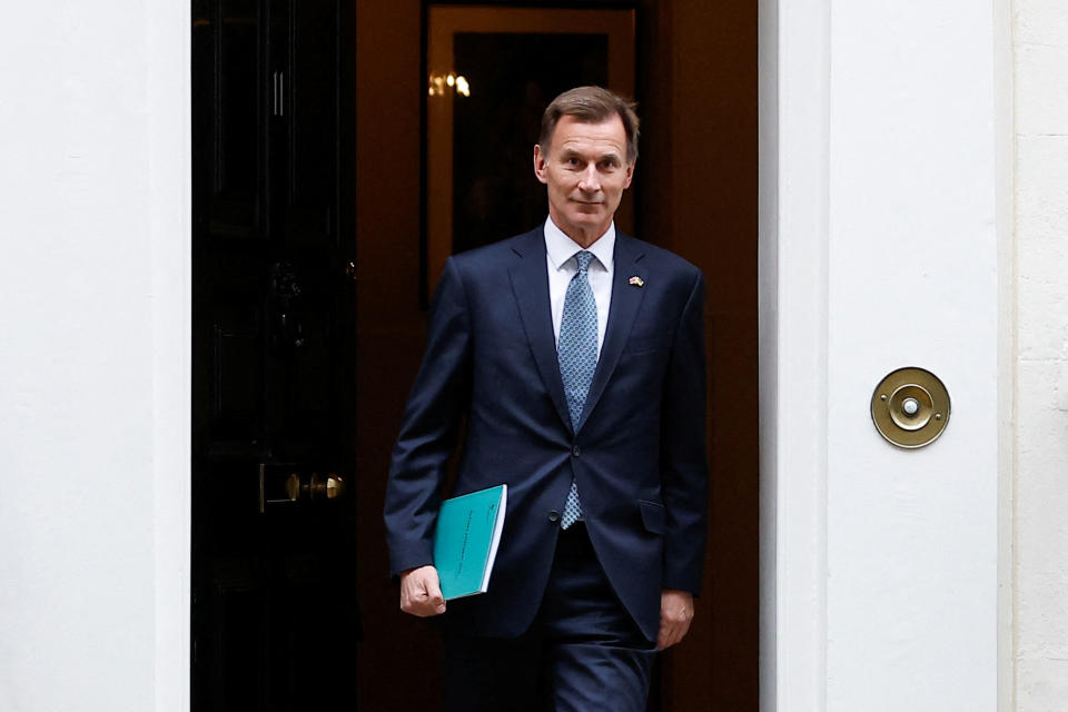 Britain's Chancellor of the Exchequer Jeremy Hunt walks at Downing Street in London, Britain, November 17, 2022. REUTERS/Peter Nicholls