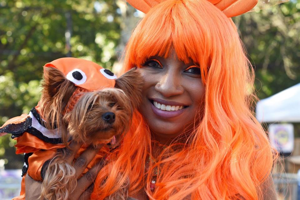 woman and her Yorkie both dressed as Nemo