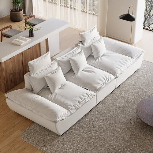 <p><a href="https://go.redirectingat.com?id=74968X1596630&url=https%3A%2F%2Fwww.homary.com%2Fitem%2F1094-modern-leathaire-3seater-sofa-in-white-adjustable-upholstered-for-living-room-45187.html&sref=https%3A%2F%2Fwww.housebeautiful.com%2Fshopping%2Ffurniture%2Fg3816%2Fcozy-couches-and-chairs%2F" rel="nofollow noopener" target="_blank" data-ylk="slk:Shop Now;elm:context_link;itc:0;sec:content-canvas" class="link ">Shop Now</a></p><p>Leath-Aire Deep Sofa with Adjustable Backrest</p><p>Homary</p><p>$2599.99</p>