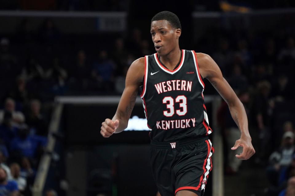 Western Kentucky's Jamarion Sharp (33) plays against Memphis in an NCAA college basketball game Friday, Nov. 19, 2021, in Memphis, Tenn. (AP Photo/Karen Pulfer Focht)