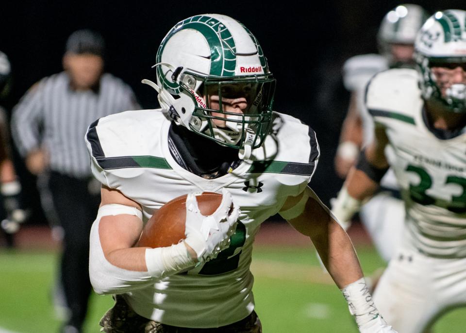 Pennridge running back Brennan Fisher runs the ball for a 6-yard touchdown against Central Bucks West in a PIAA District One Class 6A playoff game at War Memorial Field in Doylestown Borough on Friday, November 5, 2021. The Bucks advance to the quarterfinals after defeating the Rams 19-17.