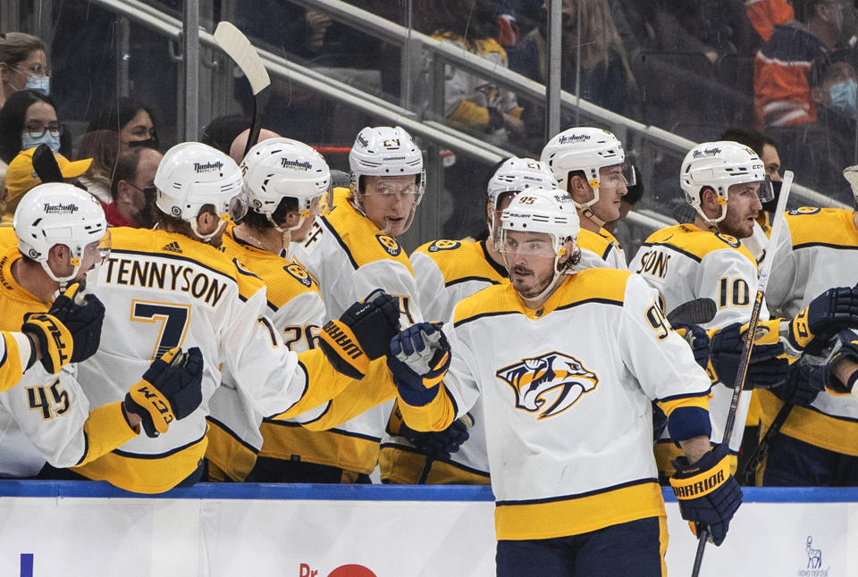 Nashville Predators' Matt Duchene (95) celebrates a goal against the Edmonton Oilers during the second period of an NHL hockey game, Thursday, Jan. 27, 2022 in Edmonton, Alberta. (Jason Franson/The Canadian Press via AP)