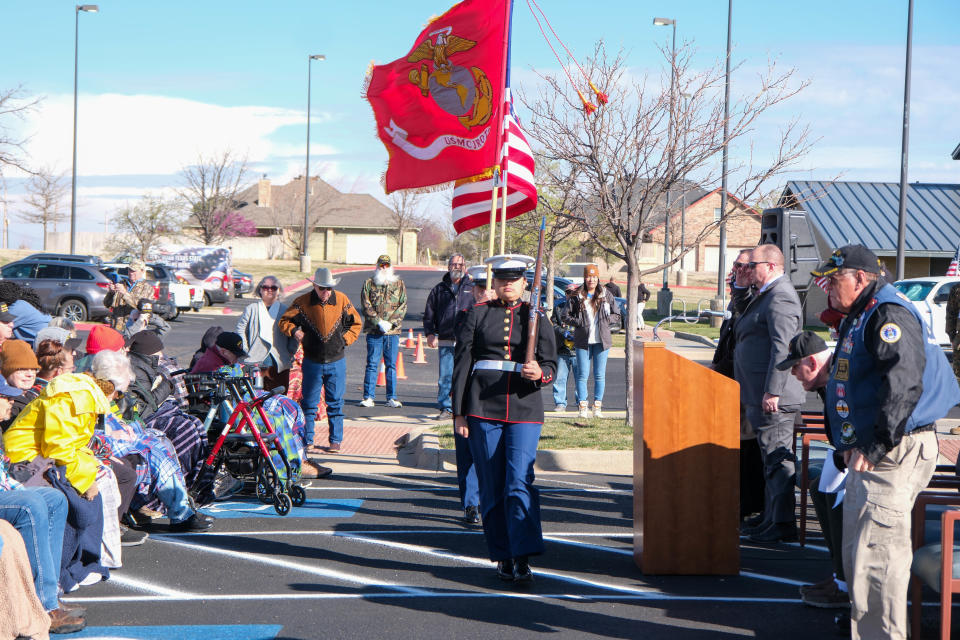 The Tascosa JROTC Marine Color Guard bring the colors to the front at the opening ceremony for the Vietnam Traveling Memorial Wall Wednesday at the Ussery-Roan Texas State Veterans Home in Amarillo.