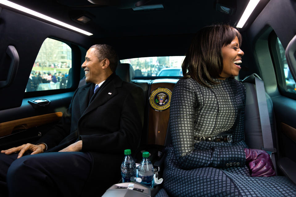 President Barack Obama and first lady Michelle Obama ride in the inaugural parade in Washington, D.C. on Jan. 21, 2013.