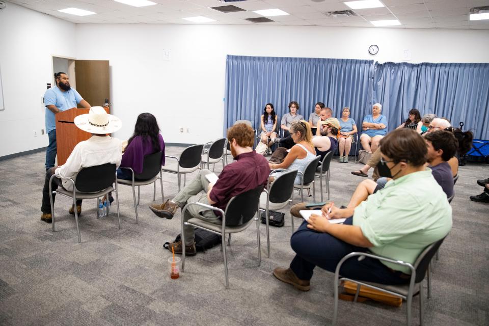 NM CAFé organizer Daniel Sanchez speaks to community members during NM CAFé's A Discussion: Police Reform and Accountability event at Thomas Branigan Memorial Library on Tuesday, June 7, 2022.