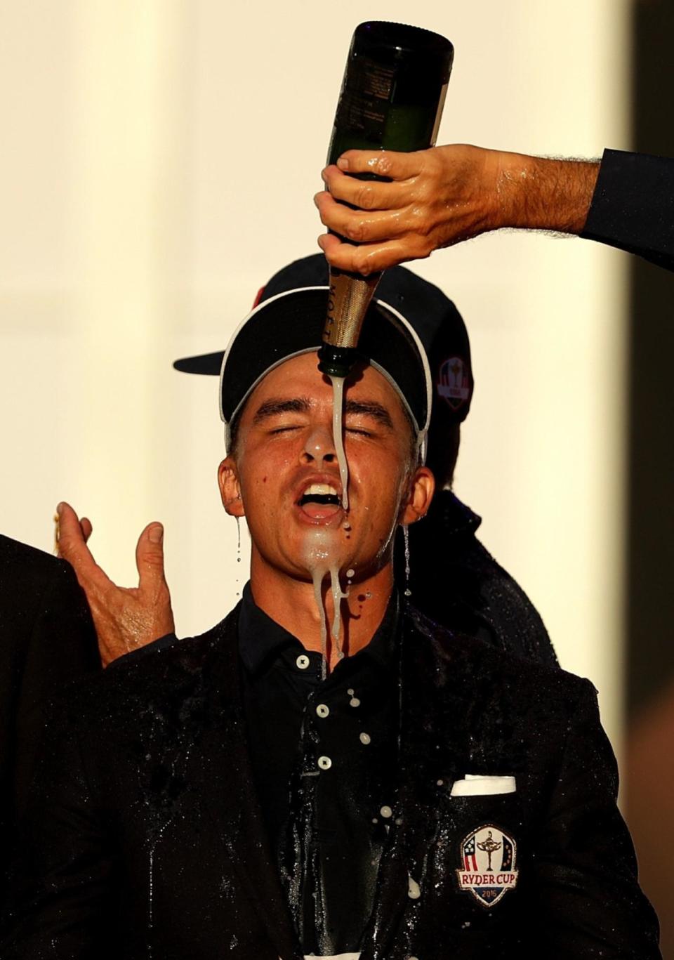 <p>Rickie Fowler of the United States celebrates with champage after winning the Ryder Cup during the closing ceremony of the 2016 Ryder Cup at Hazeltine National Golf Club on October 2, 2016 in Chaska, Minnesota. (Photo by Streeter Lecka/Getty Images)</p>