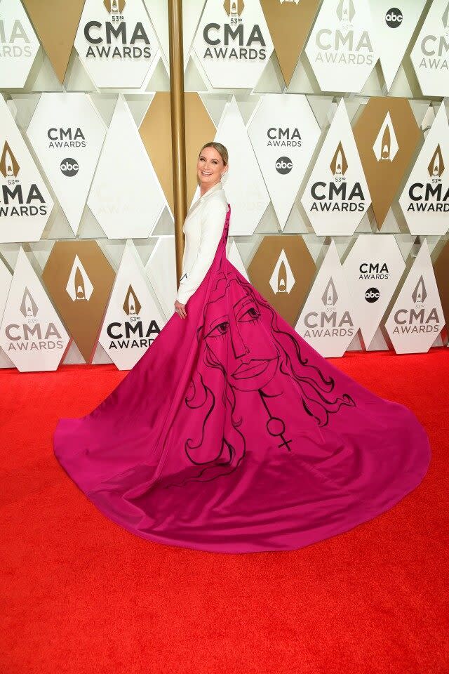 The Sugarland singer stands for equality in a statement-making suit on the CMA Awards red carpet.