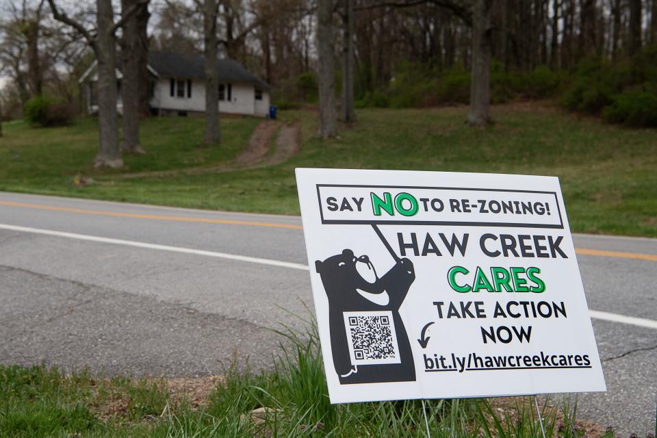 A sign opposing re-zoning in Haw Creek on New Haw Creek Road, April 4, 2024.