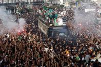 <p>Une immense foule aux couleurs vert et blanc a acclamé les nouveaux champions d'Afrique de football à Alger. </p>