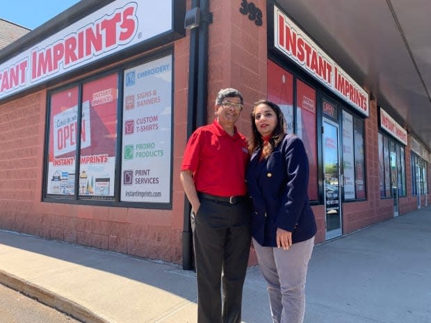 Ranjit and Priya Chatterjee are proud of their Instant Imprints franchise in Charlottetown. (Sara Fraser/CBC - image credit)