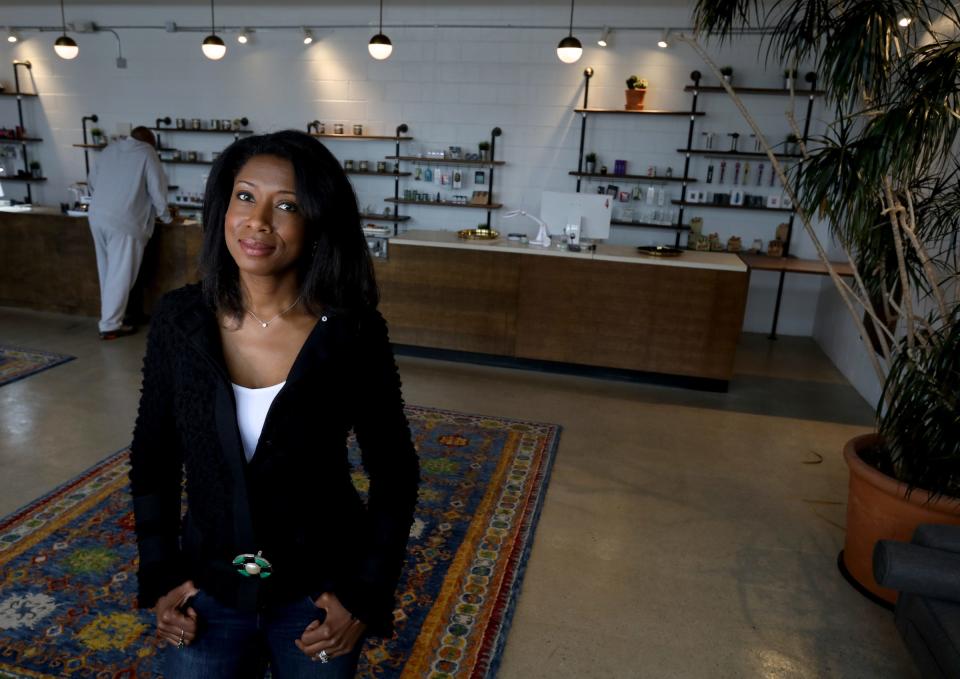 Anqunette Sarfoh stands inside her medical marijuana dispensary, Botaniq, in Detroit, Michigan on Thursday, June 20, 2019. Botaniq is one of a small number of licensed minority business in the growing in marijuana market in the state of Michigan.