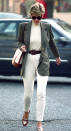 <p>It could quite easily be a street style snap from today, yet believe it or not, Diana wore this very on-trend combo of white skinny jeans, a polo neck and an oversized blazer way back in 1994. (Getty Images)</p> 