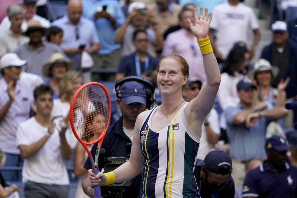 Alison Van Uytvanck, of Belgium, waves to the crowd after defeating Venus Williams, of the United States, during the first round of the US Open tennis championships, Tuesday, Aug. 30, 2022, in New York. (AP Photo/Seth Wenig)