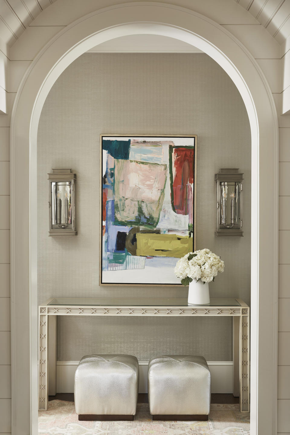 Neutral hallway with artwork